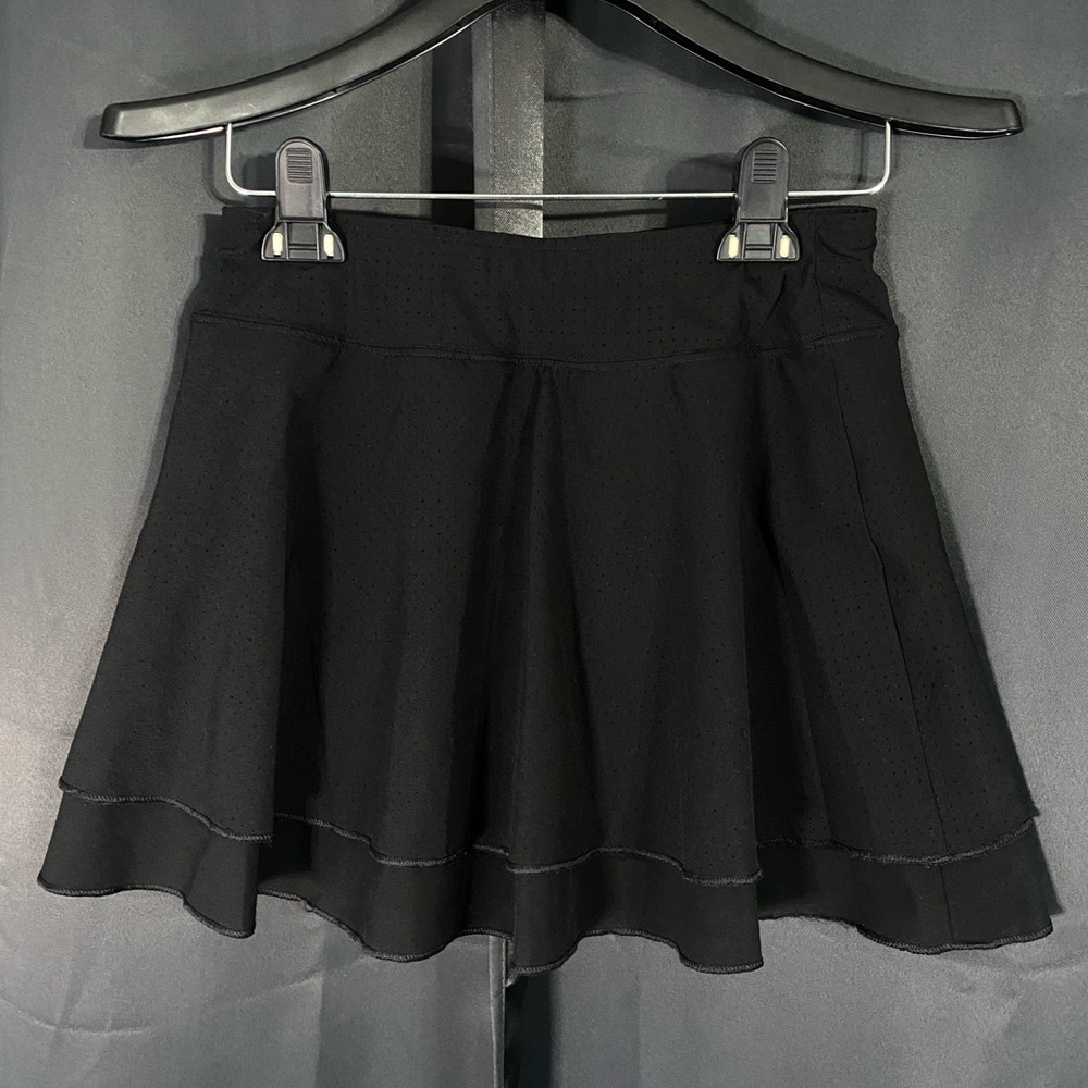Black athletic mini golf or tennis skirt with built in shorts by Prince